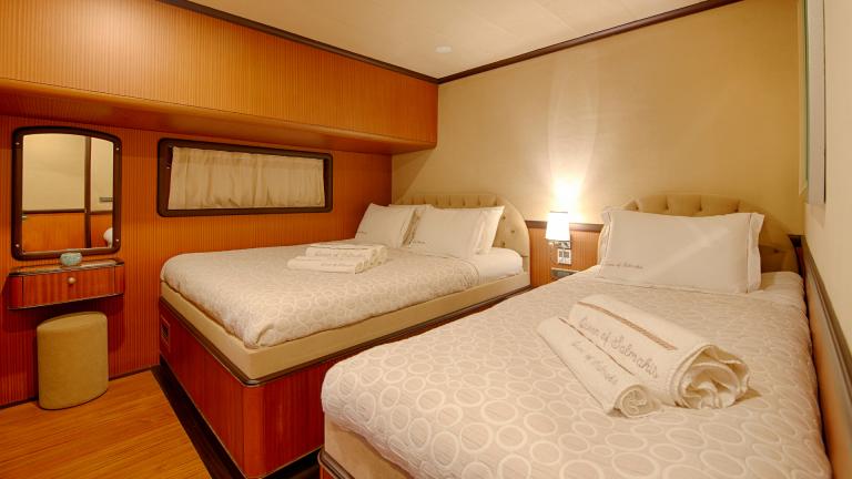 Triple bedroom gulets. You can see a large bed and one single bed